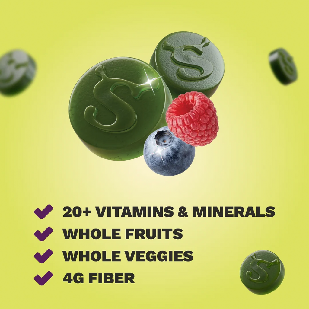 Two green gummies embossed with an S logo, next to a raspberry and blueberry, above a checklist reading 20+ Vitamins & Minerals, Whole Fruits, Whole Veggies, and 4g Fiber, on a yellow-green background.