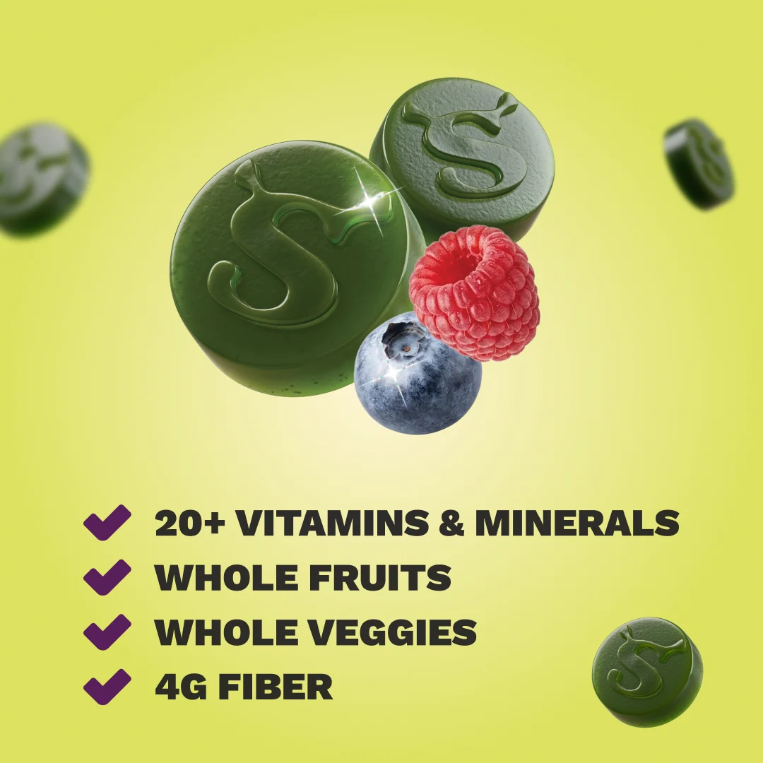 Two green gummies embossed with an S logo, next to a raspberry and blueberry, above a checklist reading 20+ Vitamins & Minerals, Whole Fruits, Whole Veggies, and 4g Fiber, on a yellow-green background.