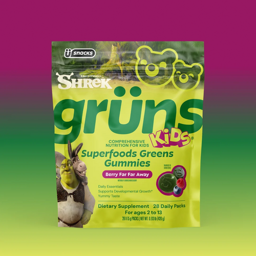 Yellow-green Shrek Kids Grüns Superfoods Greens Gummies package featuring Shrek and Donkey, labeled Berry Far Far Away flavor, listing Daily Essentials, Supports Developmental Growth, Yummy Taste, Dietary Supplement, 28 Daily Packs, for ages 2 to 13, on a purple-to-green gradient background.